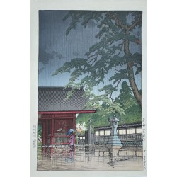 Hasui Kawase - Pluie de printemps au temple Gokoku